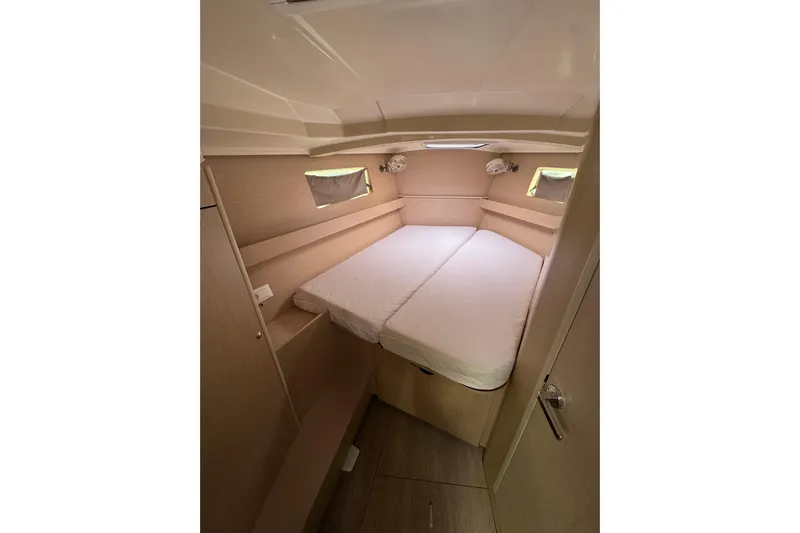 Nafsika Yacht Photos Pics Cozy cabin interior of 2020 Beneteau Oceanis 41.1 sailboat with double bed.