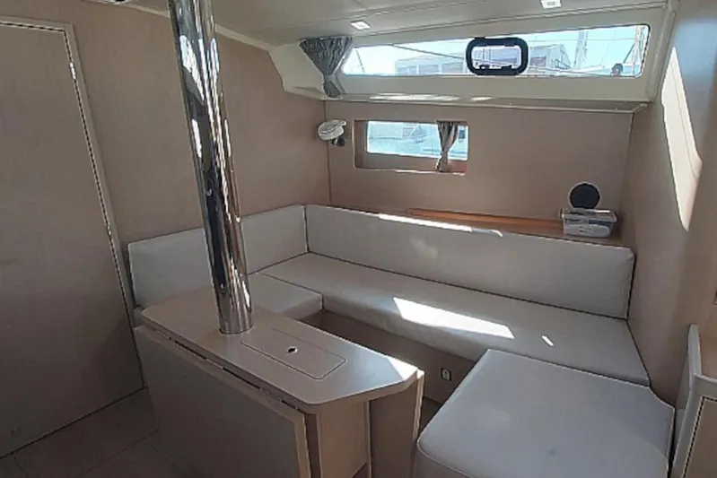 Nafsika Yacht Photos Pics Interior of 2020 Beneteau Oceanis 41.1 yacht with modern seating and natural light.