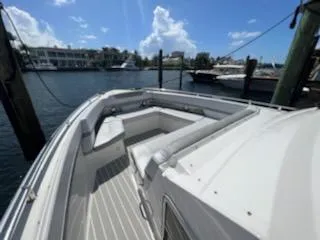 Happy2gether Yacht Photos Pics 2021 Formula 380 Super Sport Crossover OB docked, featuring spacious seating and sleek design.