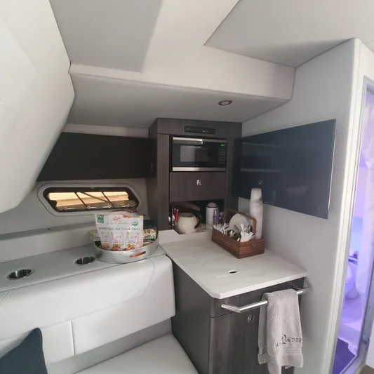 Happy2gether Yacht Photos Pics 2021 Formula 380 Super Sport Crossover OB interior kitchen area with modern amenities.