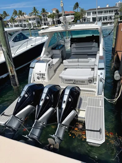Happy2gether Yacht Photos Pics 2021 Formula 380 Super Sport Crossover OB docked with triple outboard engines.