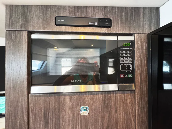 Happy2gether Yacht Photos Pics Microwave and Sony device in 2021 Formula 380 Super Sport Crossover OB interior.