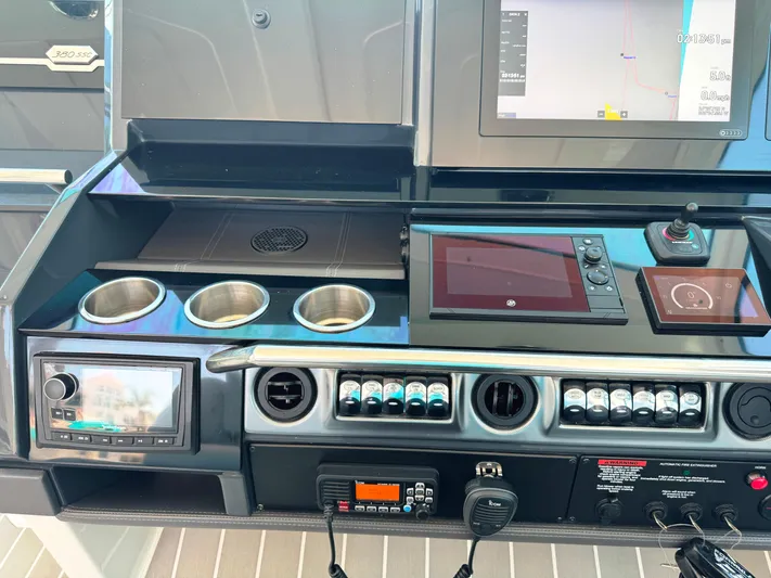 Happy2gether Yacht Photos Pics Control panel of a 2021 Formula 380 Super Sport Crossover OB boat.