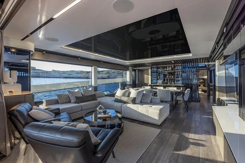 Pearly Spencer Yacht Photos Pics Luxurious interior of 2024 Pearl 82 yacht with modern furnishings and ocean view.