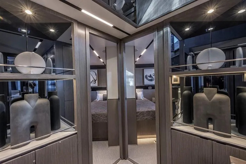 Pearly Spencer Yacht Photos Pics Luxurious interior of 2024 Pearl 82 yacht with modern decor and elegant lighting.