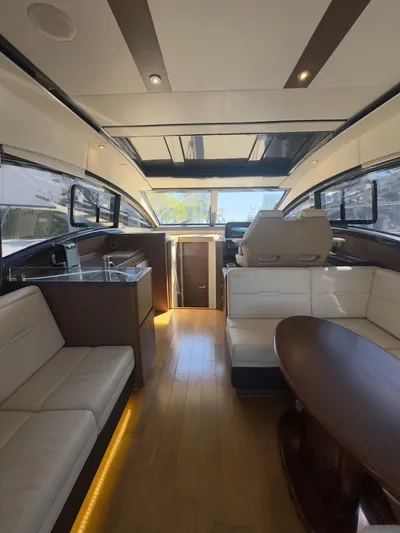 La Bella Vita Yacht Photos Pics Interior of 2016 Sea Ray 400 Sundancer yacht with modern seating and sleek design.