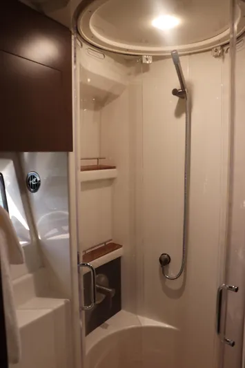 La Bella Vita Yacht Photos Pics Shower area in 2016 Sea Ray 400 Sundancer yacht, featuring modern fixtures and sleek design.