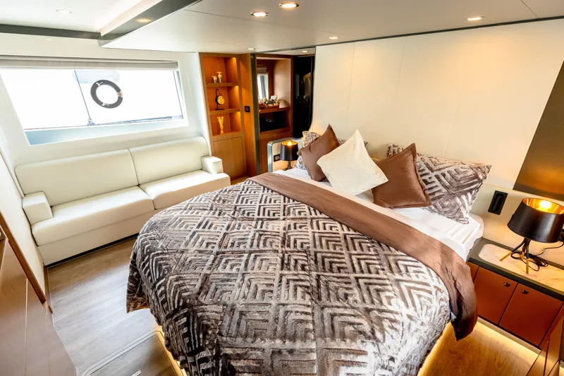  Yacht Photos Pics Luxurious Skywalker X62 yacht bedroom with elegant decor and modern furnishings, 2025 model.