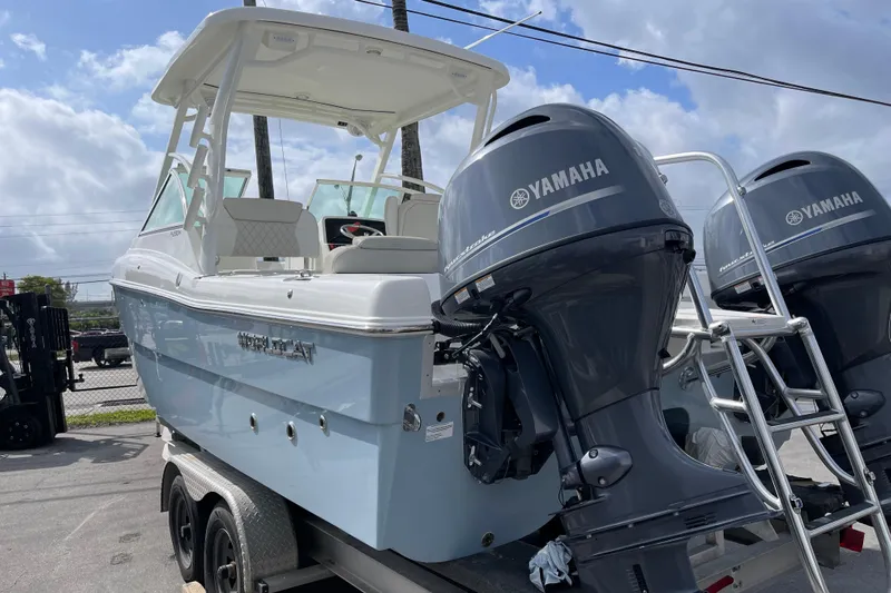 55889 230dc Sf Yacht Photos Pics 2025 World Cat 230 DC boat with Yamaha engines on a trailer.