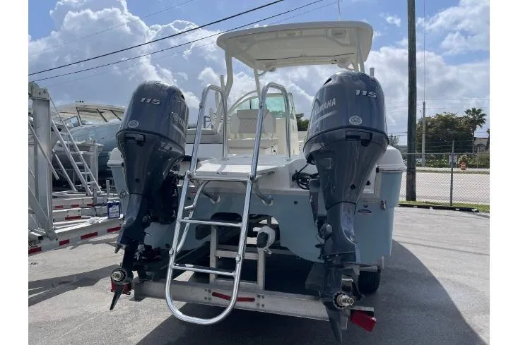 55889 230dc Sf Yacht Photos Pics 2025 World Cat 230 DC boat with dual Yamaha 115 engines, rear view.