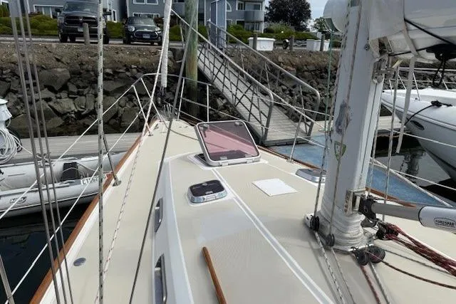 Star Yacht Photos Pics 1998 Sabre 402 sailboat docked, showcasing deck and rigging details.