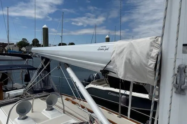 Star Yacht Photos Pics Sailboat Sabre 402, 1998 model, docked at marina with clear sky background.