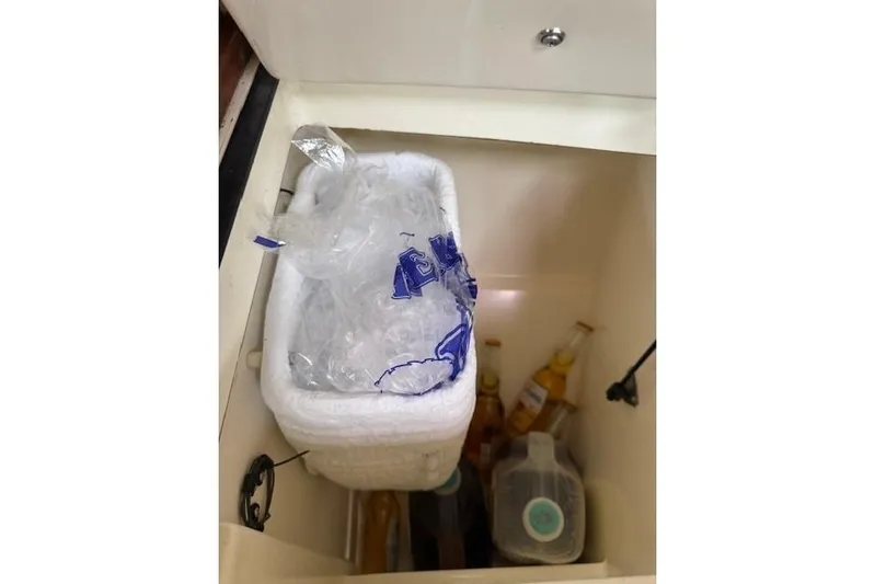 Star Yacht Photos Pics Cooler with ice and drinks inside a Sabre 402, 1998 model.