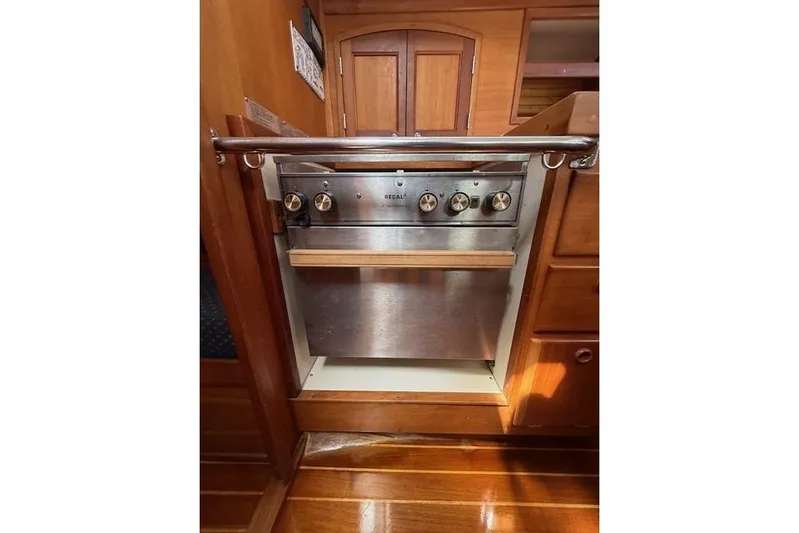 Star Yacht Photos Pics Stainless steel oven in a 1998 Sabre 402 yacht interior.