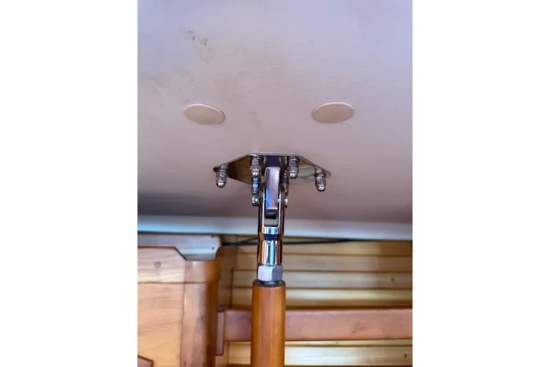 Star Yacht Photos Pics Close-up of a 1998 Sabre 402 sailboat's interior mast support and ceiling attachment.