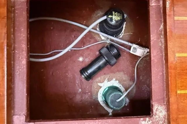 Star Yacht Photos Pics Boat bilge compartment with wiring and fittings, Sabre 402, 1998 model.