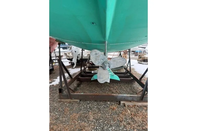 Star Yacht Photos Pics Bottom view of a 1998 Sabre 402 sailboat on a stand, showing the propeller.