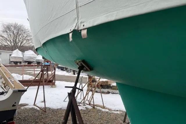 Star Yacht Photos Pics 1998 Sabre 402 sailboat in winter storage, covered and supported on stands.