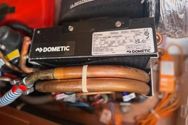 Squeeze De Citron Yacht Photos Pics Dometic unit with copper pipes in a 2023 Dufour 37 yacht.