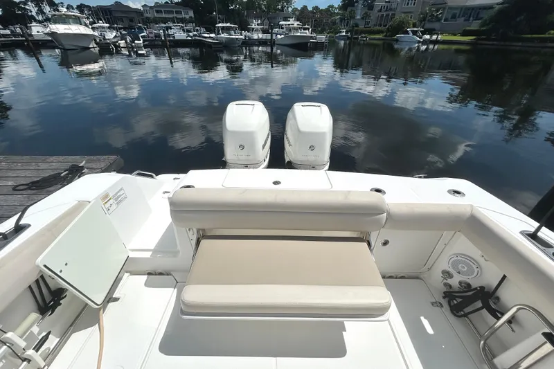  Yacht Photos Pics 2017 Boston Whaler 330 Outrage boat with dual engines docked at marina.