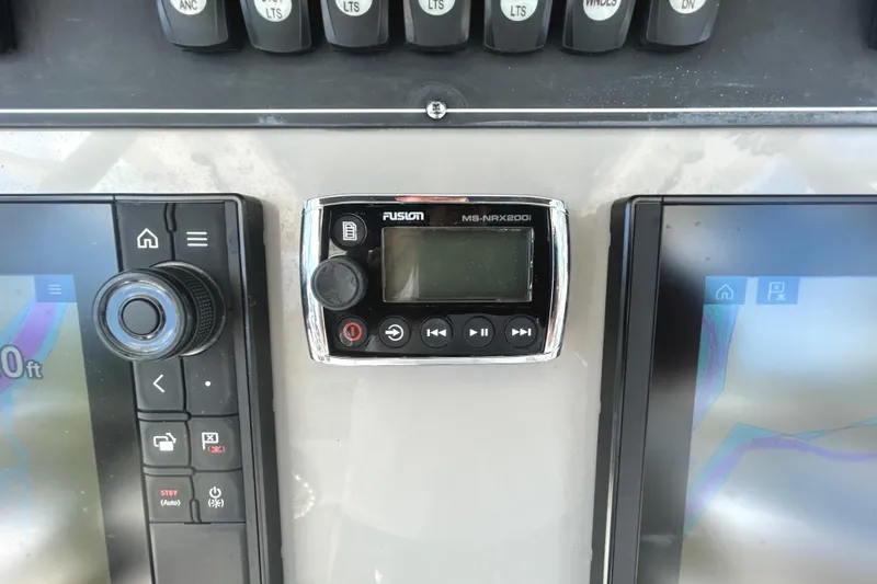  Yacht Photos Pics Control panel of a 2017 Boston Whaler 330 Outrage boat with Fusion MS-NRX200i.