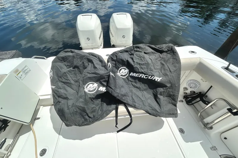  Yacht Photos Pics 2017 Boston Whaler 330 Outrage with Mercury engine covers on deck.