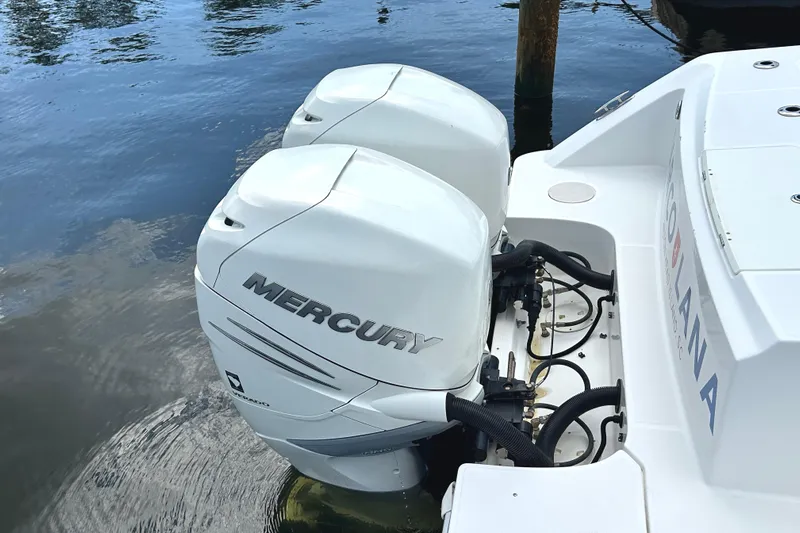  Yacht Photos Pics 2017 Boston Whaler 330 Outrage with twin Mercury outboard engines on water.