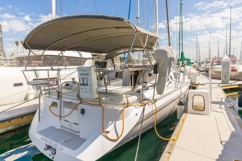 Nina Mia Yacht Photos Pics 2018 Catalina 385 sailboat docked at Marina del Rey, California, with covered cockpit.