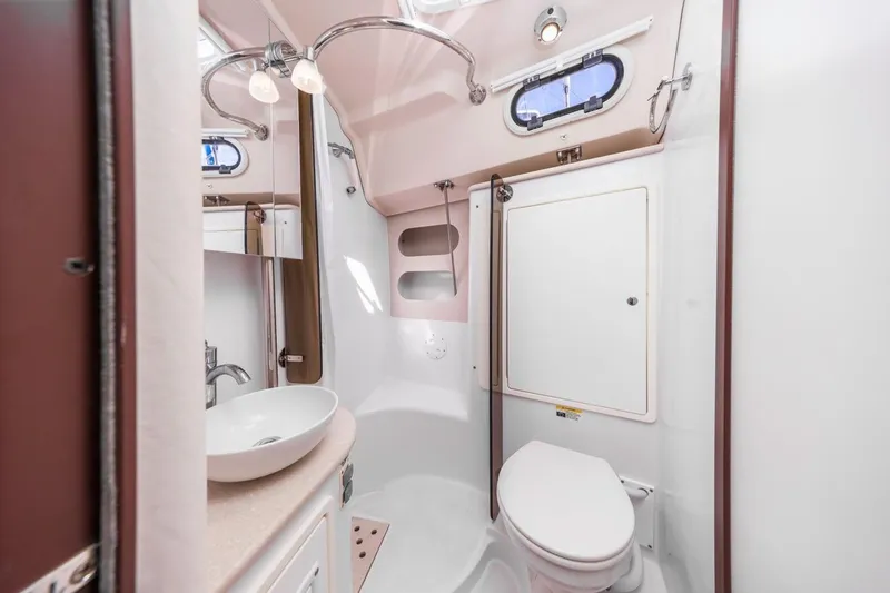 Nina Mia Yacht Photos Pics Modern bathroom in 2018 Catalina 385 yacht, featuring sleek fixtures and compact design.