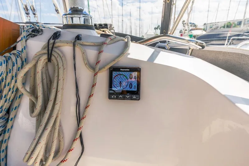 Nina Mia Yacht Photos Pics Cockpit of 2018 Catalina 385 sailboat with ropes and navigation display.