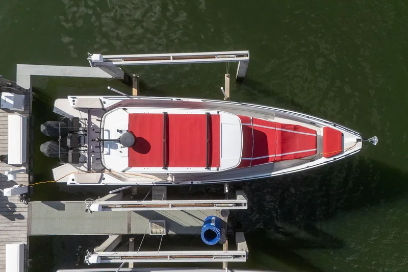 Kraken Yacht Photos Pics Aerial view of 2023 Axopar SHADOW 900ST boat docked.