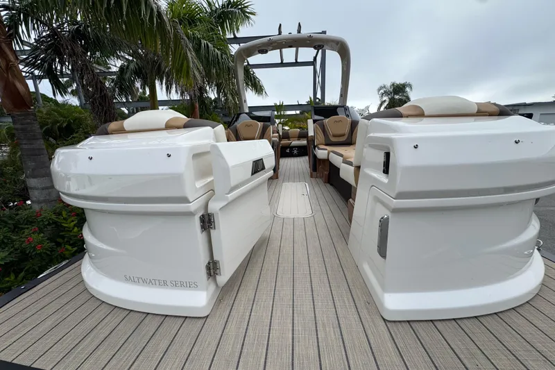  Yacht Photos Pics 2026 Avalon Excalibur 27' boat interior with luxurious seating and sleek design.