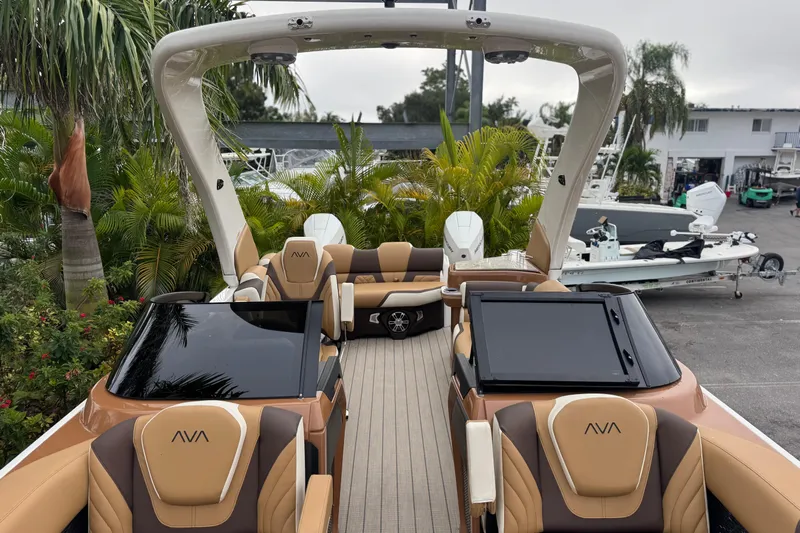  Yacht Photos Pics Luxurious 2026 Avalon Excalibur 27' boat with elegant seating and modern design.
