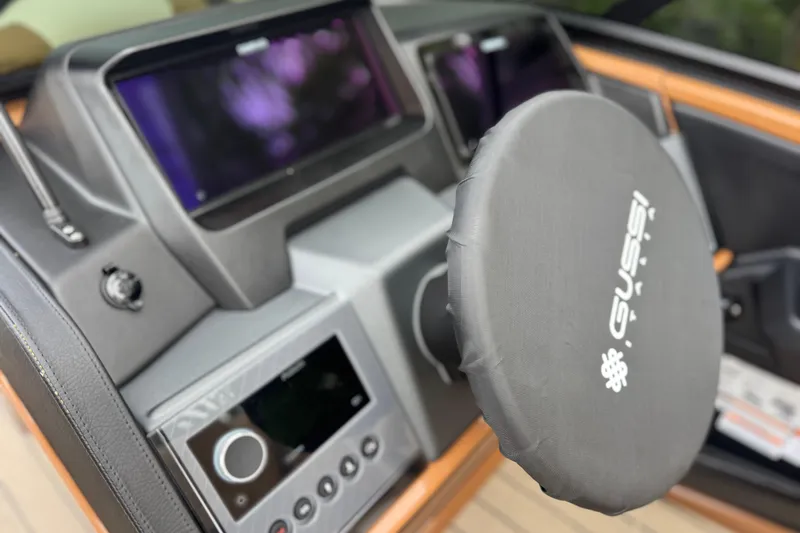  Yacht Photos Pics 2026 Avalon Excalibur 27' dashboard with Gussi Italia steering wheel cover.