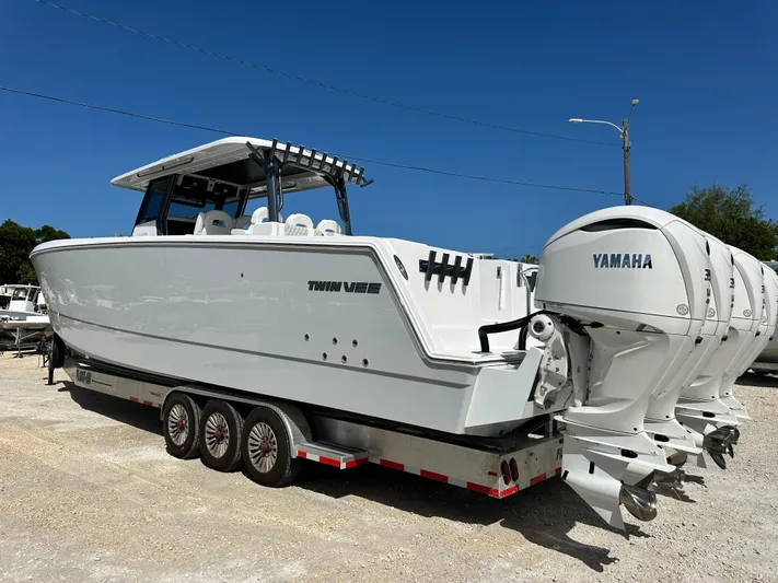  Yacht Photos Pics 2026 Twin Vee 400 GFX2 CC boat with Yamaha engines on a trailer.