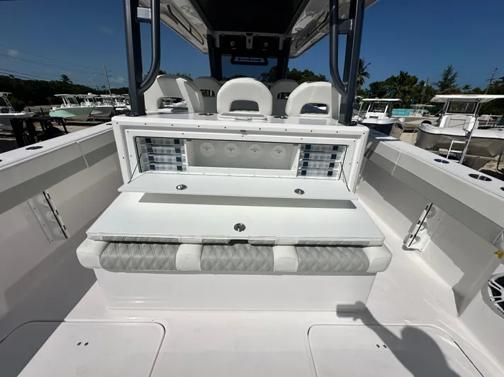  Yacht Photos Pics 2026 Twin Vee 400 GFX2 CC boat interior with seating and storage compartments.