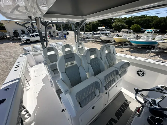  Yacht Photos Pics 2026 Twin Vee 400 GFX2 CC boat interior with luxurious seating and modern design.