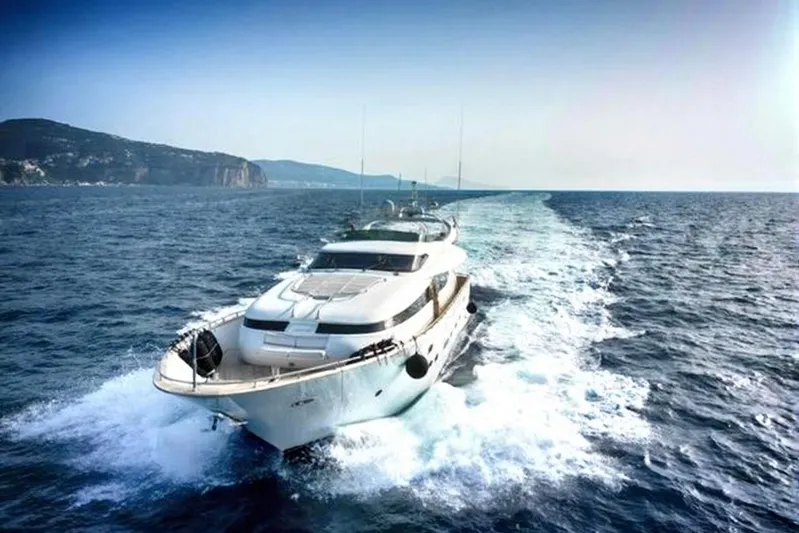  Yacht Photos Pics Luxurious 1998 Maiora MAIORA 29 DP yacht cruising on open sea.