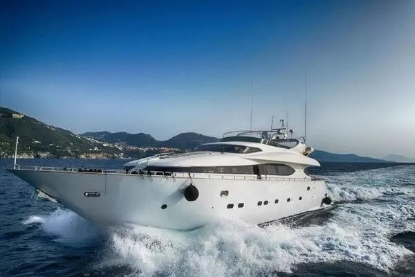  Yacht Photos Pics Luxurious 1998 Maiora MAIORA 29 DP yacht cruising on open water.