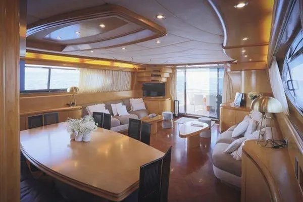  Yacht Photos Pics Luxurious interior of 1998 Maiora MAIORA 29 DP yacht with elegant wood finishes.