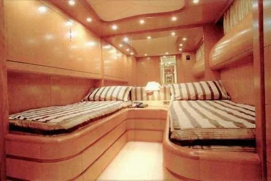  Yacht Photos Pics Luxurious cabin interior of 1998 Maiora MAIORA 29 DP yacht with twin beds.