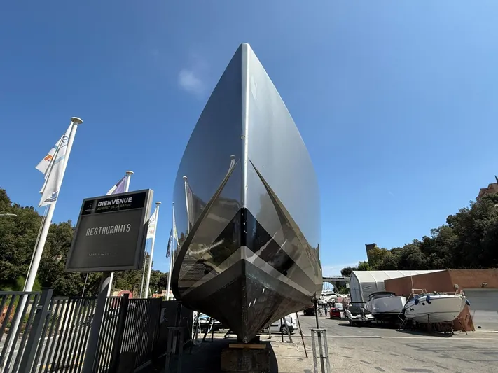  Yacht Photos Pics VanDutch 55 yacht from 2019, docked with a sleek, modern design under a clear blue sky.