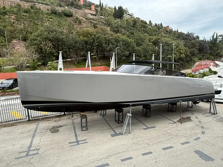  Yacht Photos Pics VanDutch 55 yacht, 2019 model, displayed on stands in a marina setting.