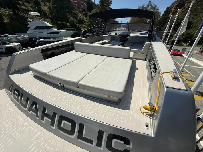  Yacht Photos Pics 2019 VanDutch 55 luxury yacht with spacious sunbathing area and sleek design.