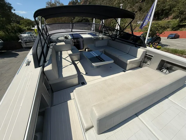  Yacht Photos Pics 2019 VanDutch 55 yacht with spacious deck and modern seating.
