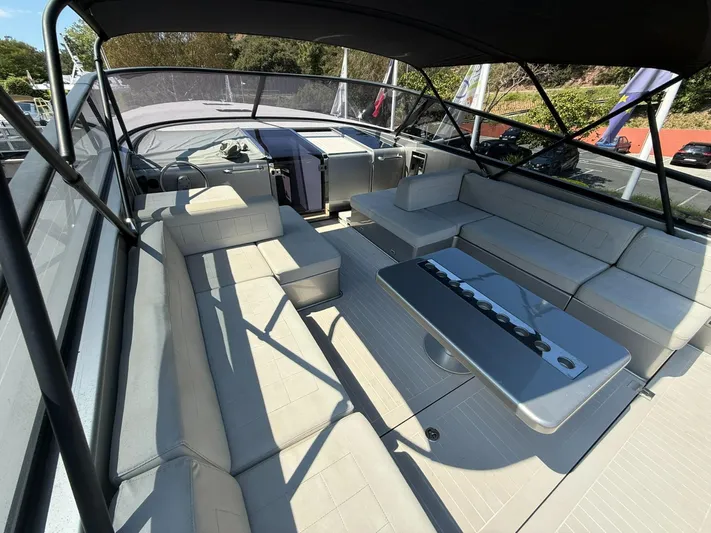  Yacht Photos Pics Luxurious interior of a 2019 VanDutch 55 yacht with spacious seating and sleek design.