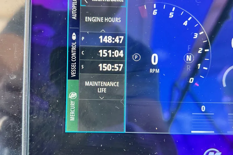  Yacht Photos Pics Dashboard display of a 2023 Formula 330 CBR showing engine hours and maintenance life.