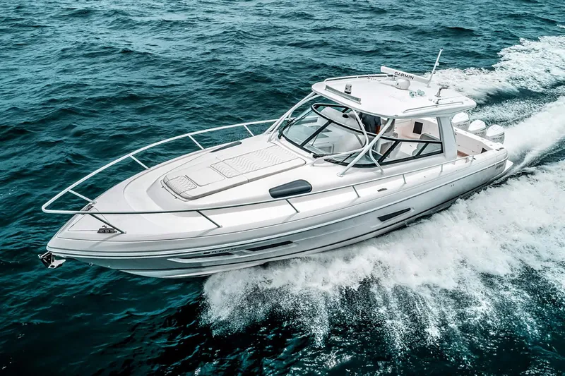  Yacht Photos Pics Manufacturer Provided Image: 2023 Intrepid 438 Evolution luxury yacht cruising on open water.