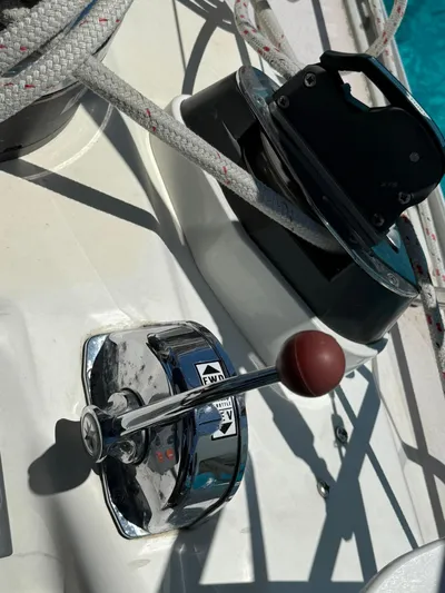  Yacht Photos Pics Throttle control on a 2005 Catalina 470 sailboat deck, with ropes and winch visible.