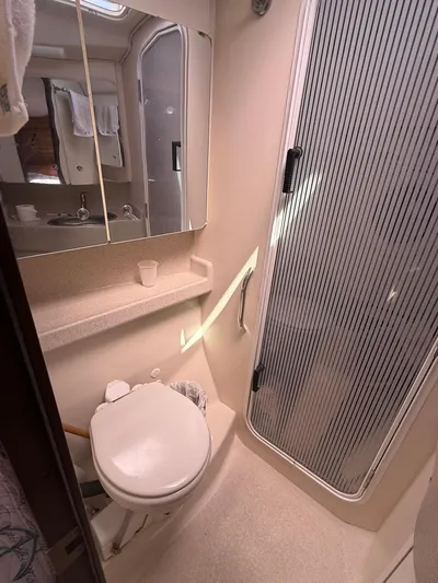  Yacht Photos Pics Bathroom interior of a 2005 Catalina 470 yacht with shower and toilet.